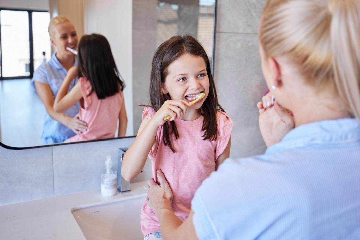 child-learning-to-brush-teeth
